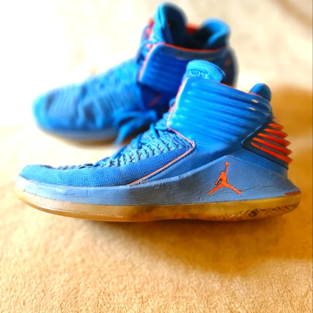 Jordan crafted by jordan  these air jordan 32 russell westbrook sneakers are part of the air jordan product line and designed with a  photo blue